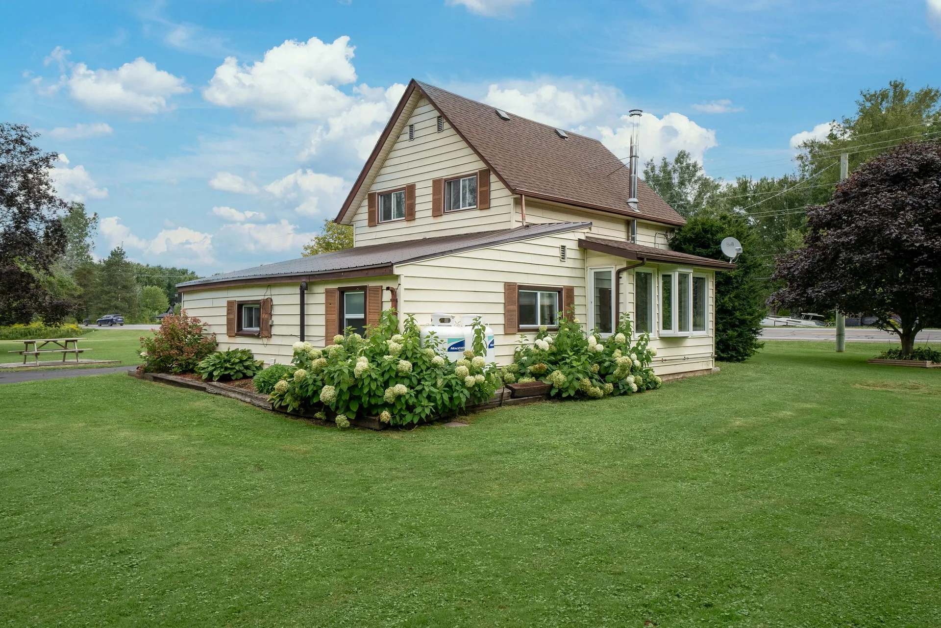 Aerial perspective of acreage and outbuildings at 21331 Loyalist Pkwy