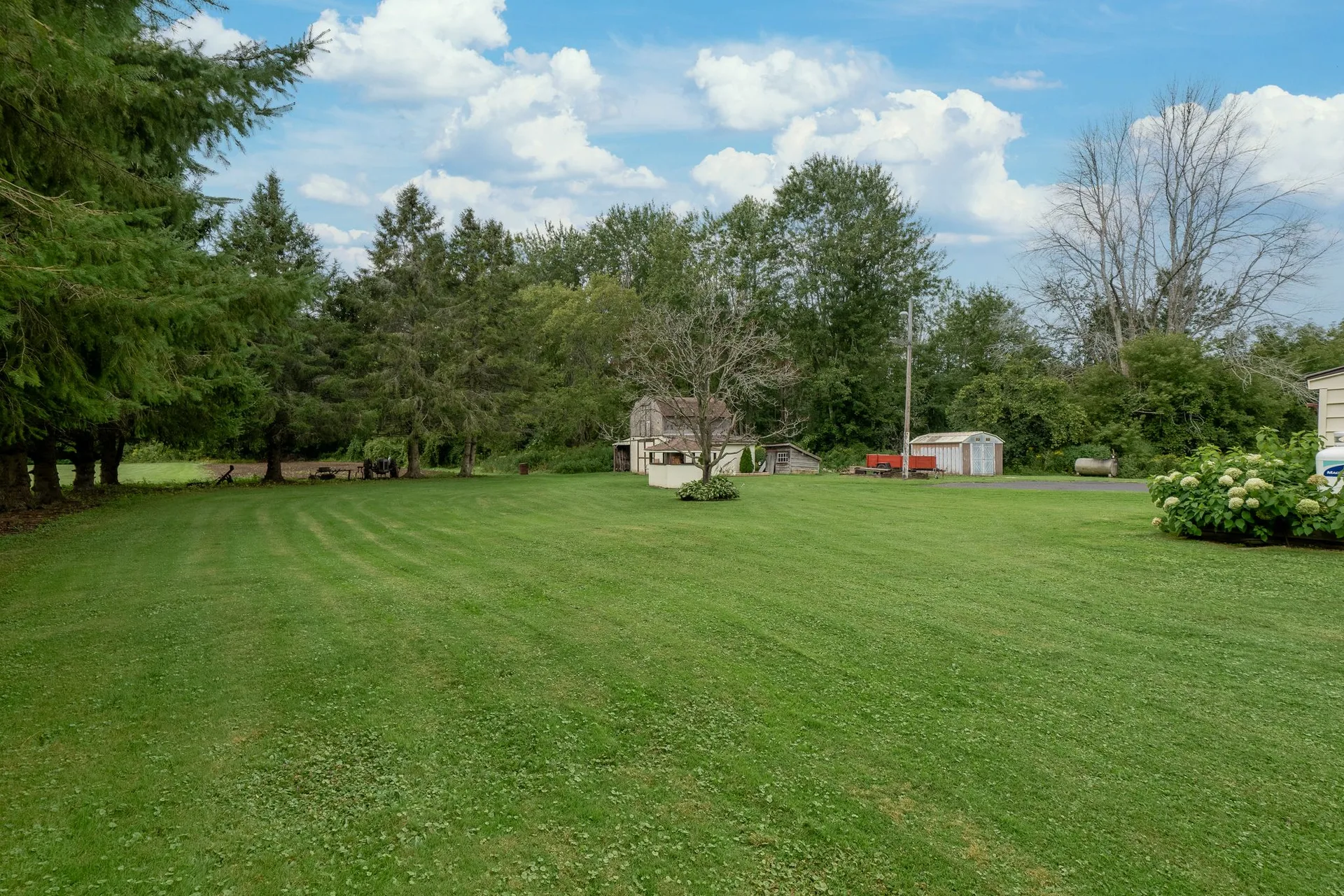 Detached equipment shed and farmyard at 21331 Loyalist Pkwy