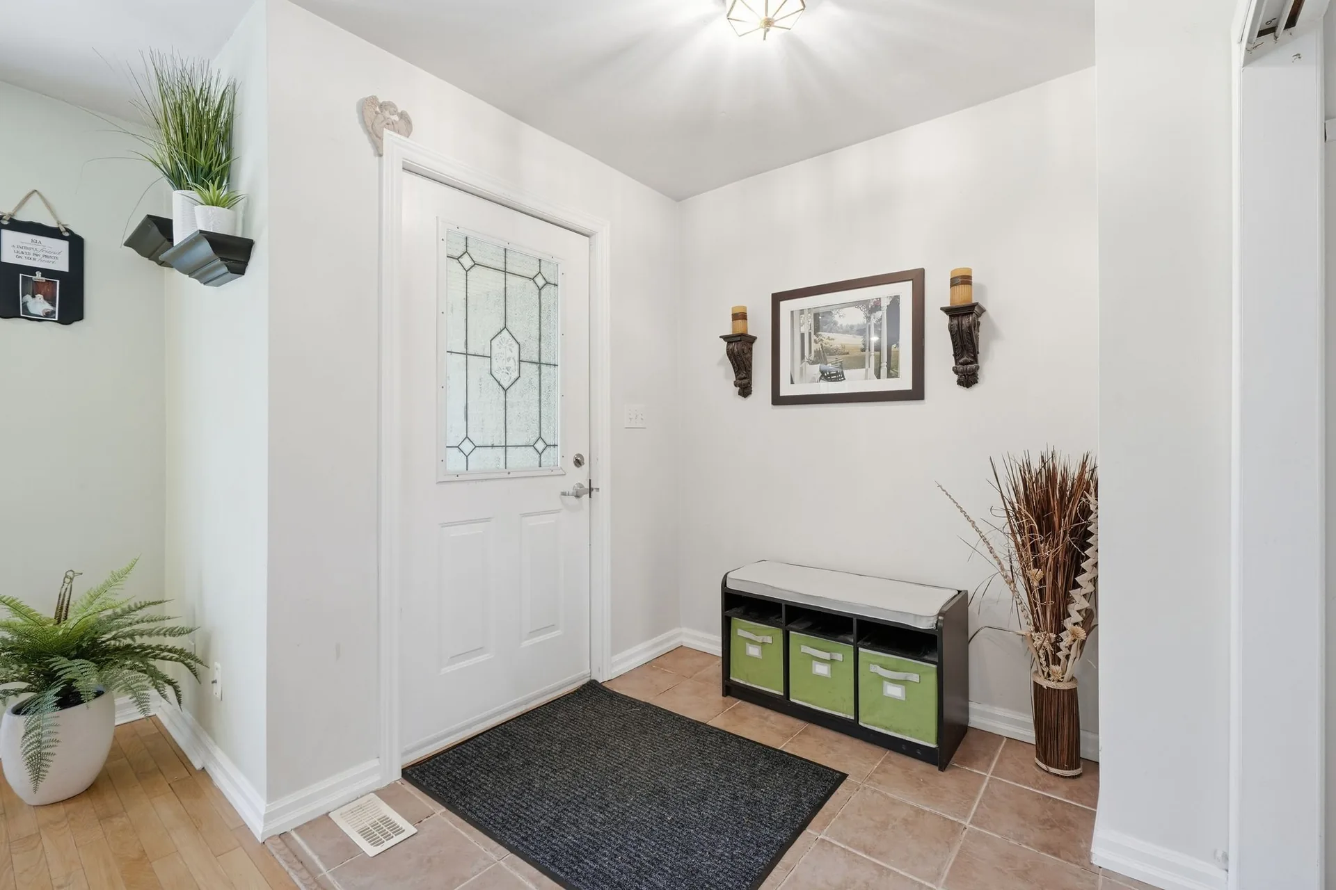 Bright front foyer and entry at 21627 Loyalist Parkway, Prince Edward County