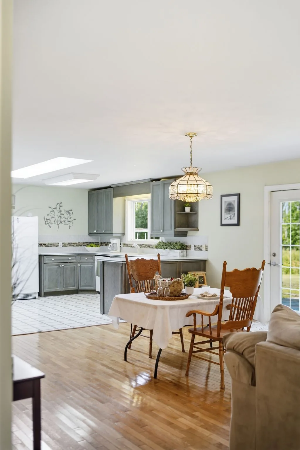 Dining space open to the kitchen at 21627 Loyalist Parkway, Prince Edward County