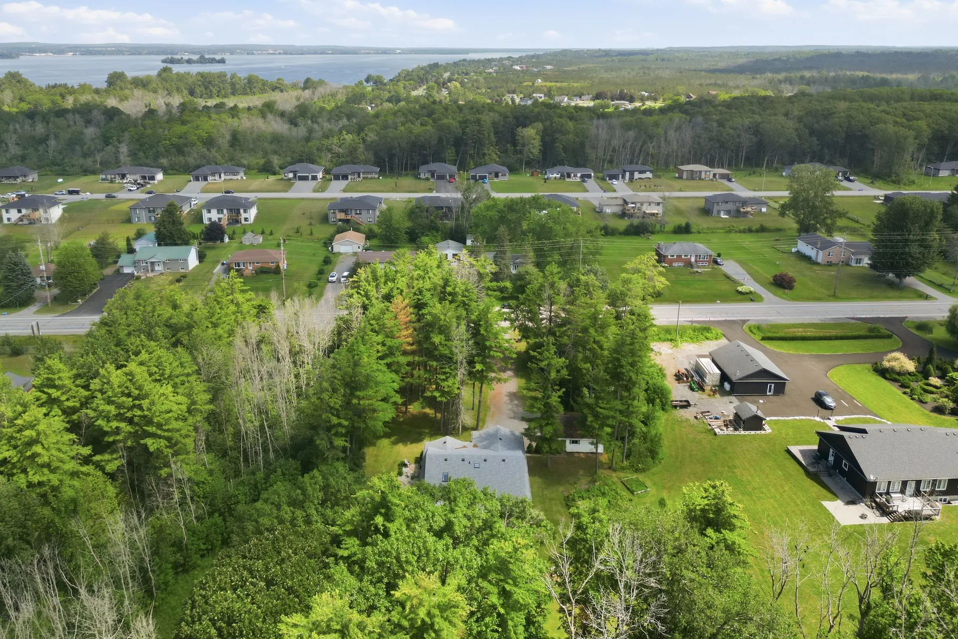 Aerial view of 21627 Loyalist Parkway and the surrounding Carrying Place area, Prince Edward County