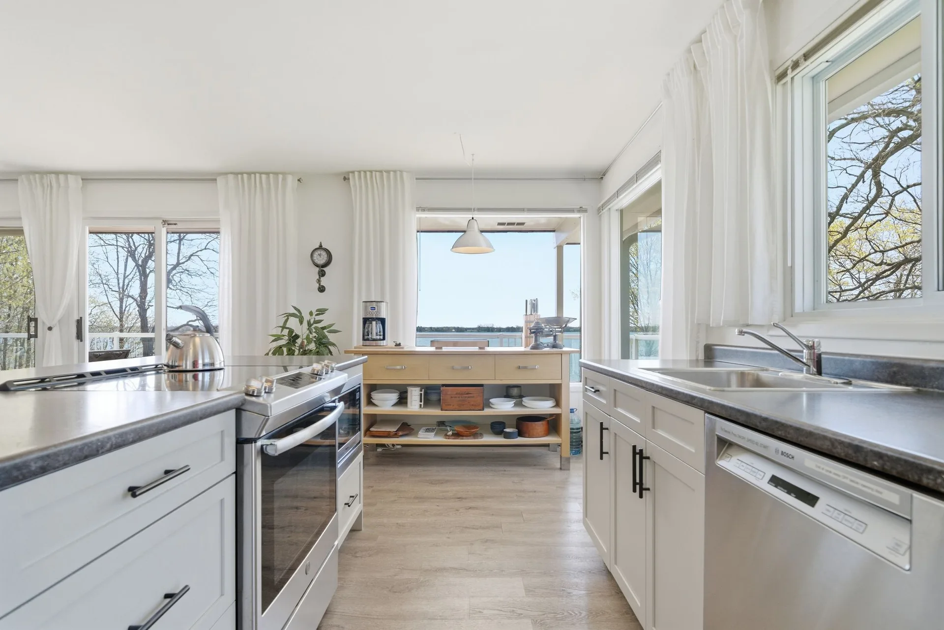 Covered deck and water views at 86 Colliers Road waterfront cottage, Prince Edward County