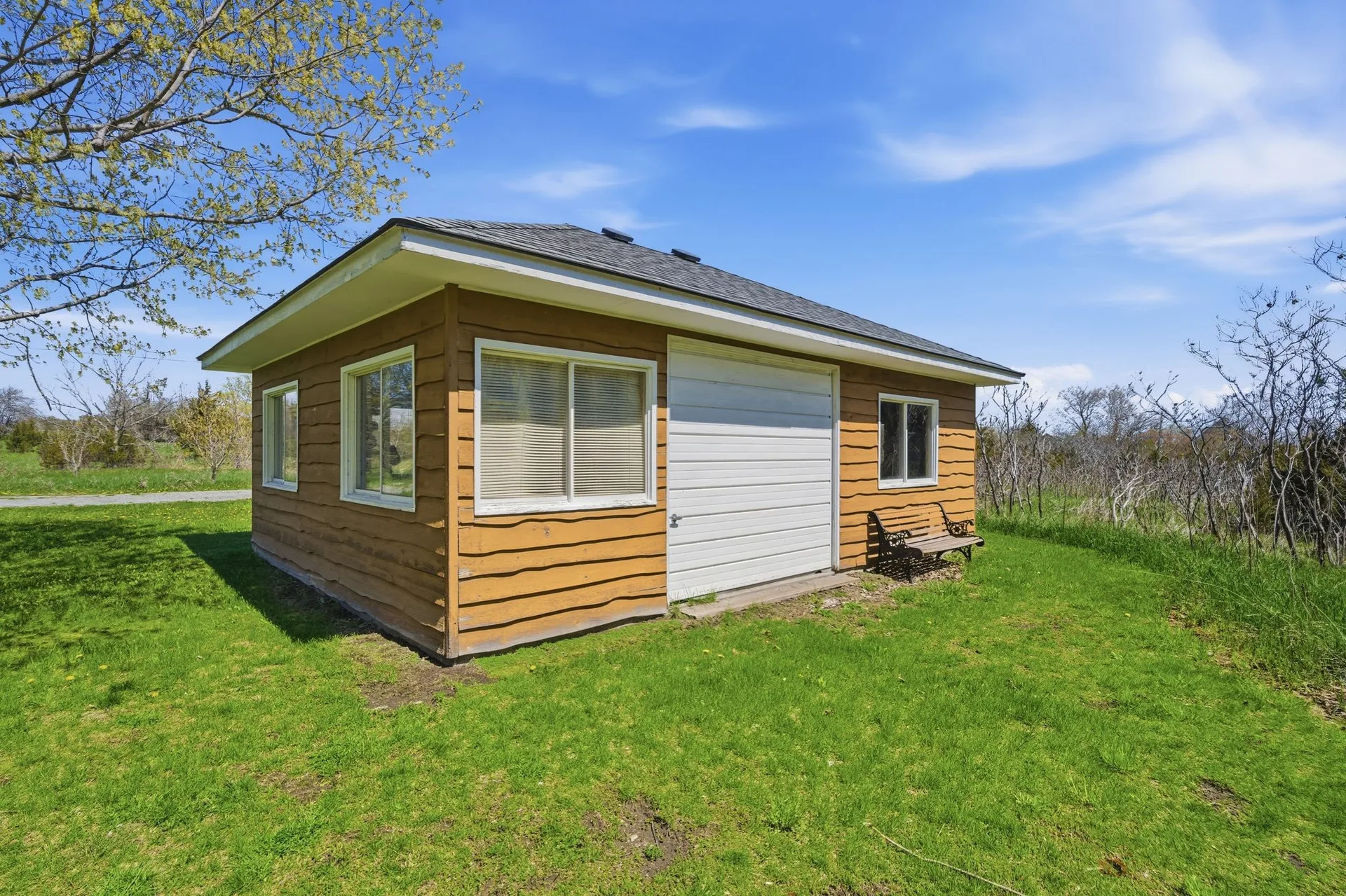 Lawn and waterfront property at 86 Colliers Road, Prince Edward County