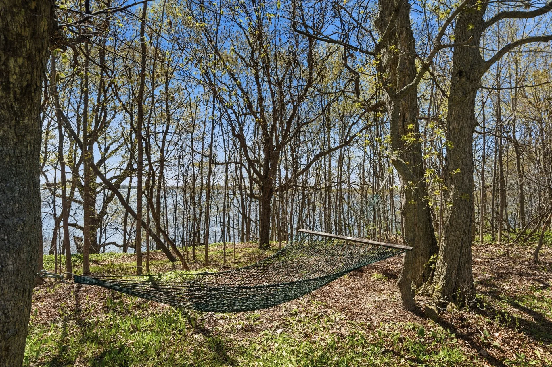 Waterfront shoreline and dock at 86 Colliers Road, South Bay, Prince Edward County