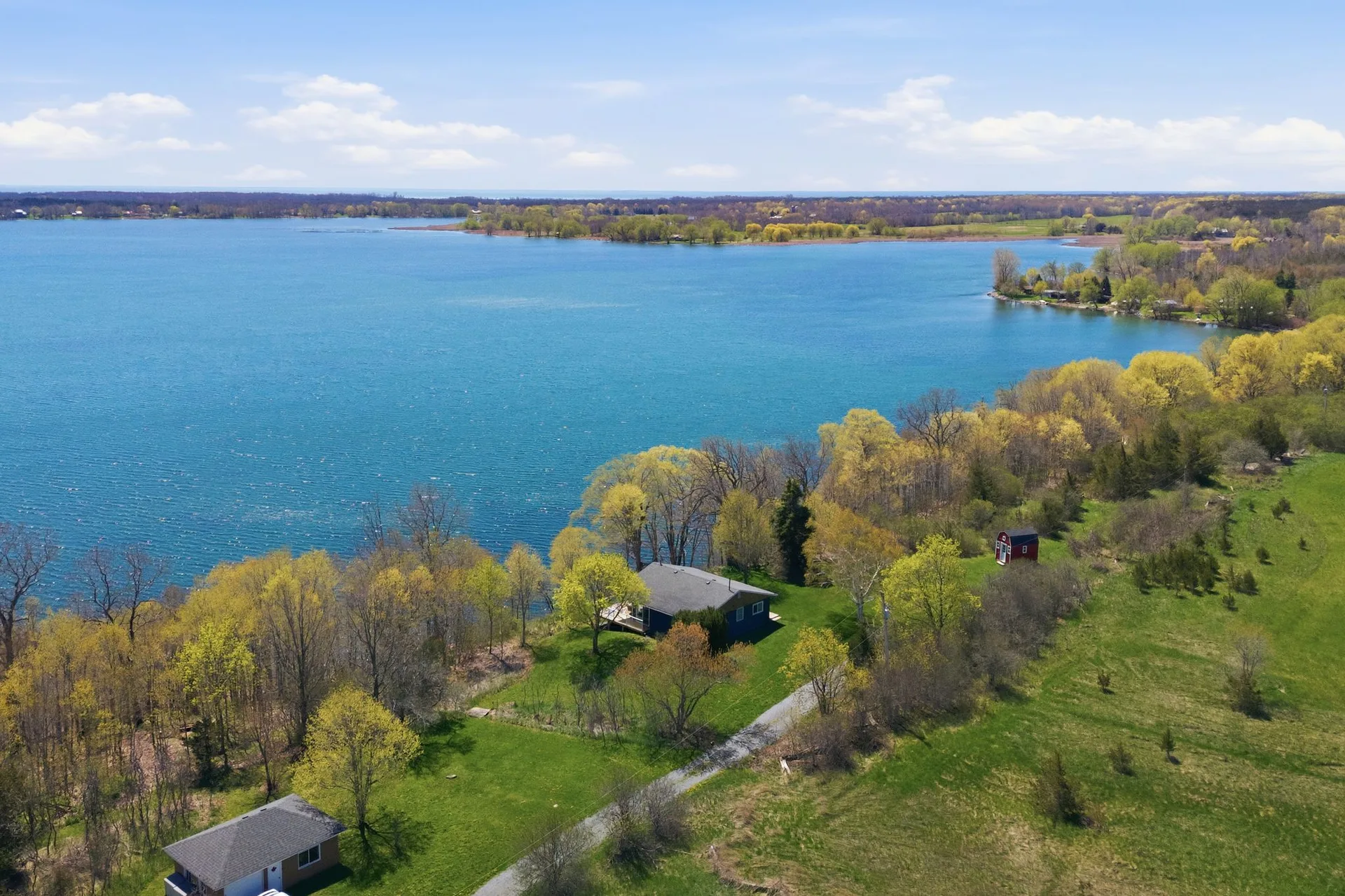 South Bay shoreline and natural surroundings at 86 Colliers Road, Prince Edward County