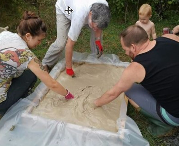 Setting up the clay slip pit for the bale raising